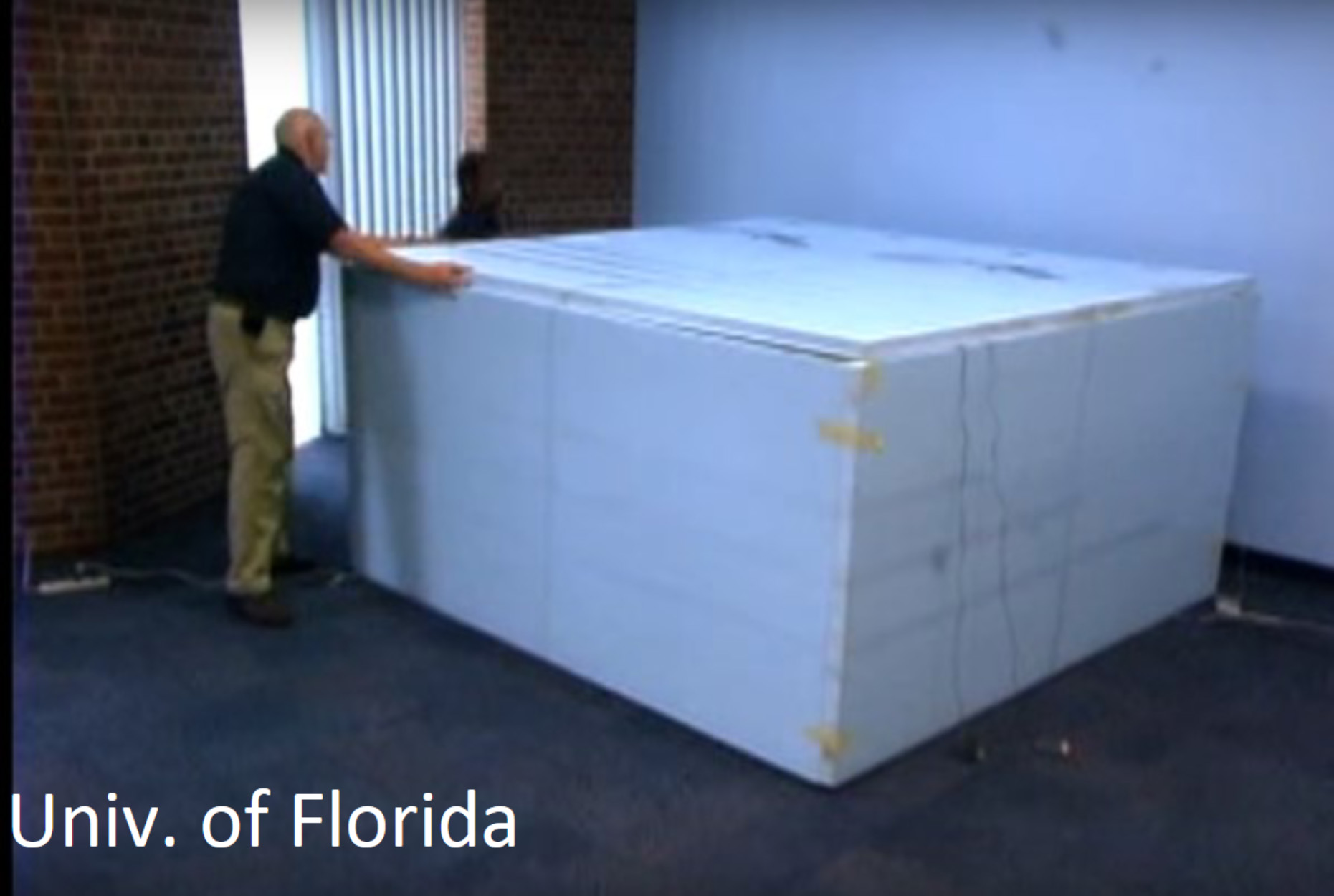 Demonstration of furniture setup with a Styrofoam box completely encasing it. (University of Florida).