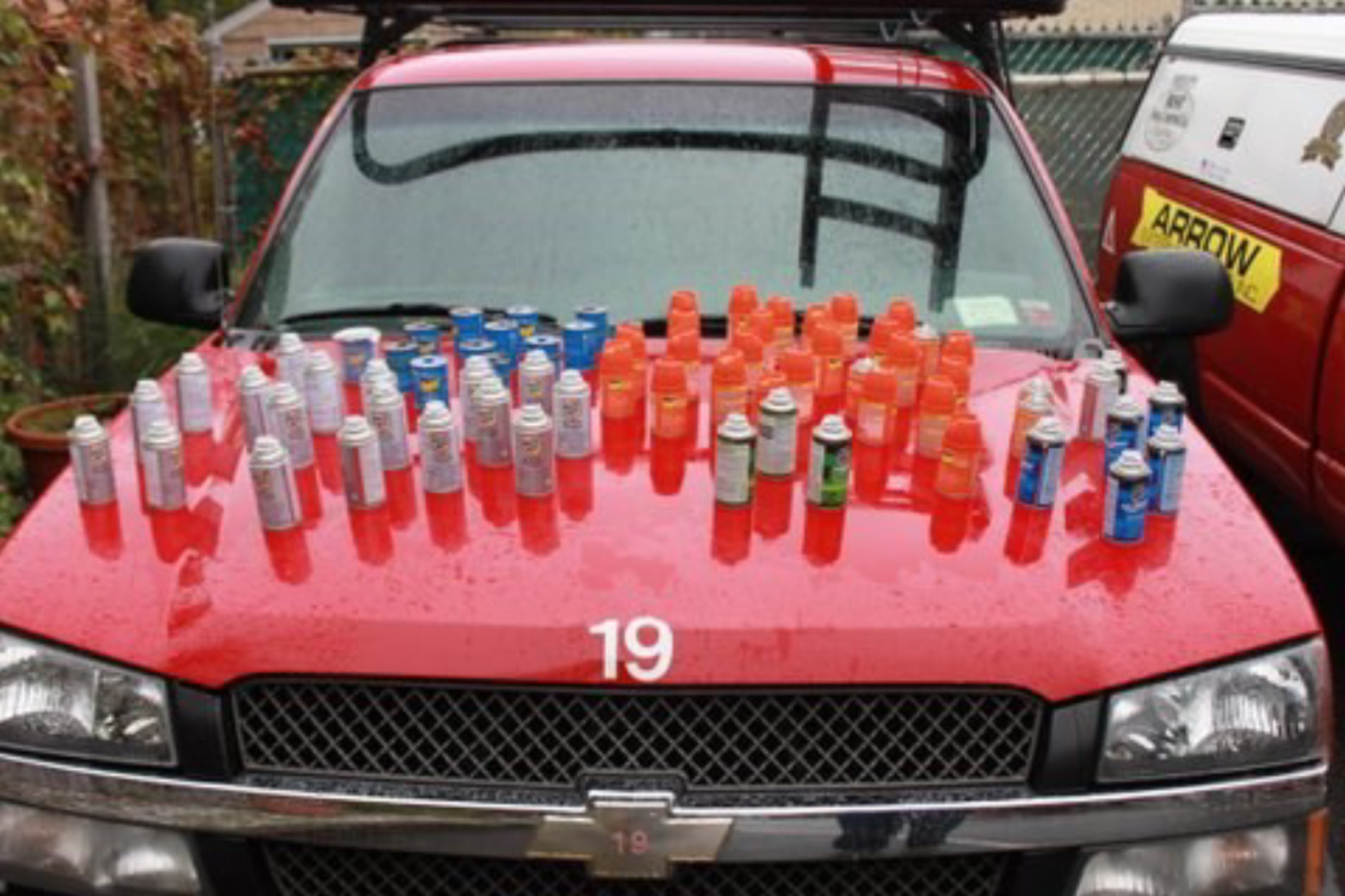 Red Truck Pickup with Bottles on hood.jpg